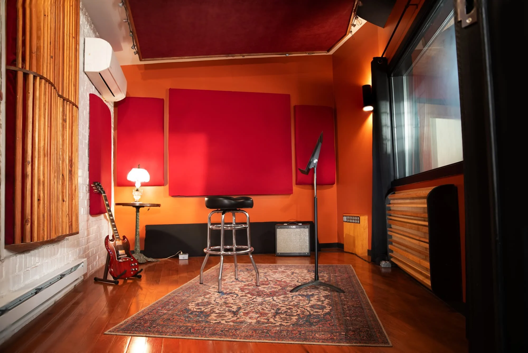 Small isolation booth for guitar amps and vocal recording at Philadelphia music studio